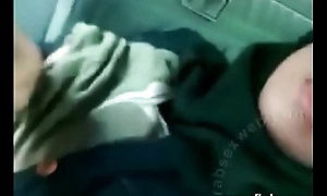 Hijab Arab termagant near passenger car